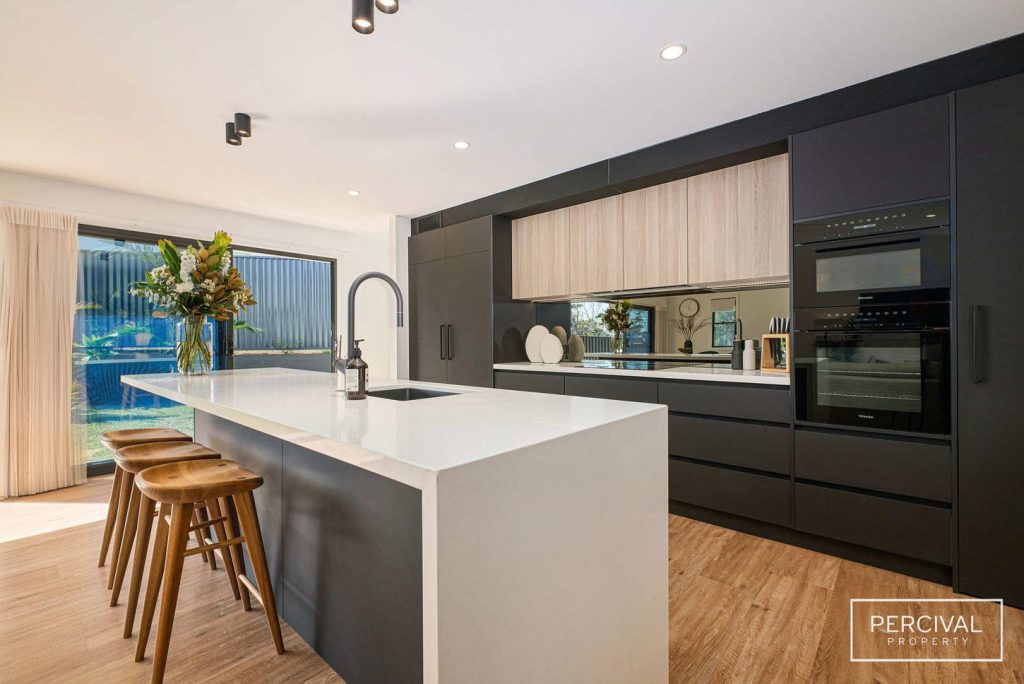 Feature Black Kitchen with timber highlights
