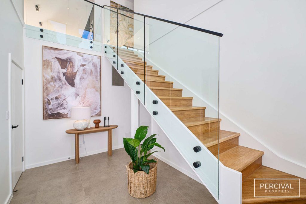 Double Height Entry Foyer with feature stair.