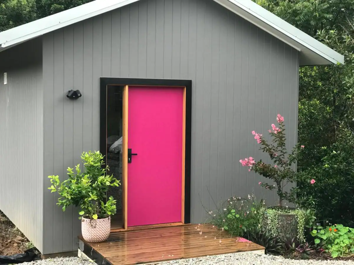 Studio Residence with Pink Entry Door.